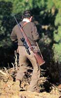 seguridad cazador con escopeta